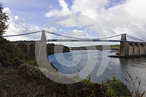 Scenic view of the historic Menai Suspension Bridge spanning the Menai Strait, Isle of Anglesey, North Wales