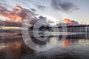 Scenic view of Huntington Beach pier at sunset. California, USA.