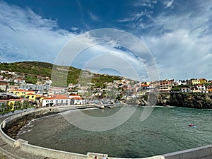 Camara de Lobos - Scenic view of idyllic port of charming fishermen village of Camara de Lobos, Madeira island, Portugal, Europe