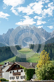 Scenic view of Innichen (San Candido) with ski slope and Haunold (Rocca dei Batanci) in background in summer