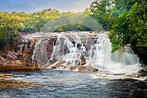 Scenic view of Iracema Presidente Figueiredo waterfall at sunset in Brazil photo