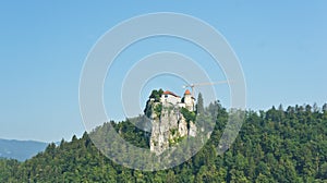 Scenic view of Julian Alps mountains and Bled castle, sunny day, Bled, Slovenia