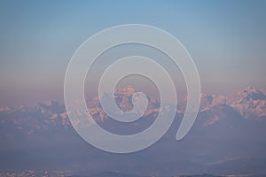 Scenic view of Karawanks (Karawanken) mountain range at early morning after sunrise seen from Saualpe, Lavanttal Alps