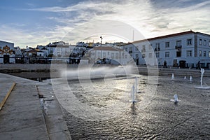 Scenic view of Lagos with seagulls and fountains Infante Dom Henrique Square in Algarve, Portugal