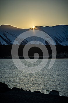 Scenic view of Lake Pukaki, New Zealand during sunset