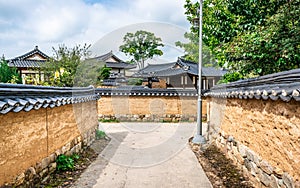 Scenic view of a laneway and traditonal houses roofs in historic Hahoe village Andong South Korea photo