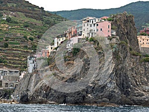 Scenic view of the little town of Vernazza on the coastline rock, Italy