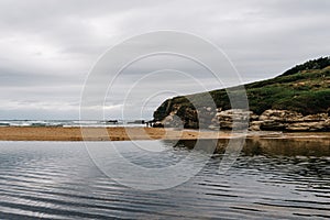 Scenic view of lonely beach a cloudy day of summer