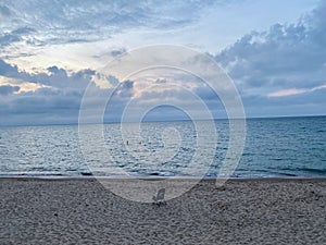 Scenic view of a lonely chair on the shore of Lake Michigan