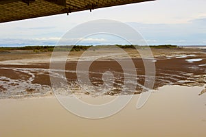 Panorama of Mudflats at Derby Wharf, Western Australia on a cloudy afternoon photo