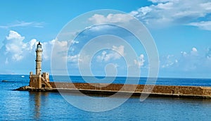 Scenic view of a long pier with a lighthouse Venetian Harbour, Chania, Crete,