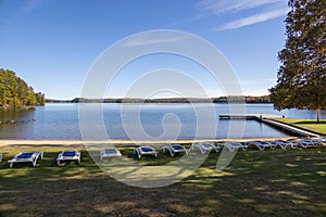 Scenic view of lounge chairs on a beach in Muskoka, Ontario