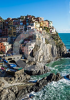 Scenic view of Manarola village and the sea in Liguria region, Cinque Terre, northern Italy on clear day.