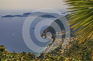 Scenic view of the Mediterranean coastline, the Alpes and medieval houses from Eze village, French Riviera, France