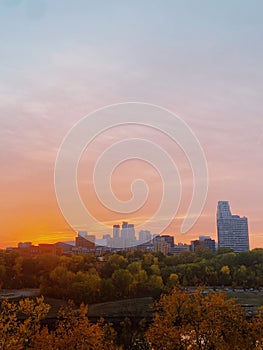 Scenic view of Minneapolis skyline on a beautiful sunset background