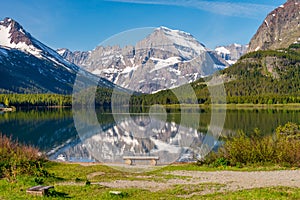 Mountain reflecting in lake.