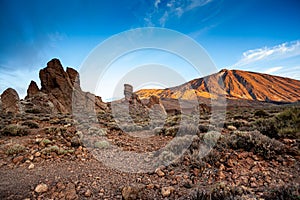 Scenic view of a mountain, rocks and a blue sky in Teide National Park in Paradores, Spain