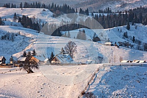 Scenic view of mountain village in the Carpathians, winter landscape, outdoor travel background