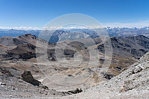 Scenic view of a mountainous landscape from Sommeiller peak between the Italian and France border photo