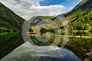 Scenic view of mountains reflecting on Eidsvatnet lake in Skjolden, Norway