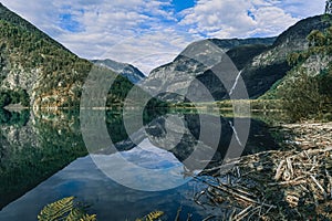 Scenic view of mountains reflecting on Eidsvatnet lake in Skjolden, Norway