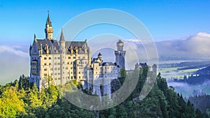 Scenic view of the Neuschwanstein Castle on the top of the mountains