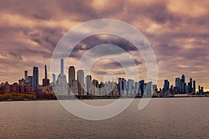 Scenic view of the New York Manhattan skyline seen from across the Hudson River in Edgewater, New Jersey