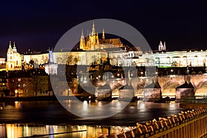 Scenic view in night of the Old Town architecture over Vltava river in Prague, Czech Republic