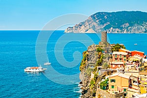 Scenic view of ocean and harbor in colorful village Vernazza, Ci