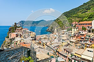 Scenic view of ocean and harbor in colorful village Vernazza, Ci