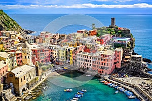 Scenic view of ocean and harbor in colorful village Vernazza, Ci