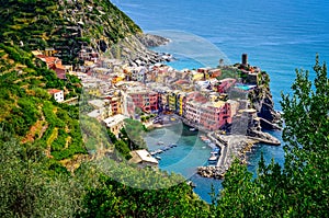 Scenic view of ocean and harbor in colorful village Vernazza, Ci photo