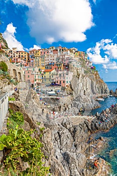 Scenic view of ocean and harbor in colorful village Vernazza, Ci