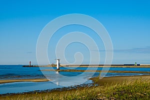 Scenic view of the old mill lighthouse at sunrise. Swinoujscie. Poland.lighthouse mill