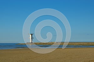 Scenic view of the old mill lighthouse at sunrise. Swinoujscie. Poland.lighthouse mill