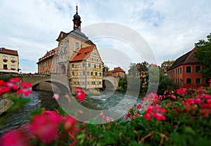 Scenic view of Old Town Hall of Bamberg under moody cloudy sky, a beautiful medieval town on the river Regnitz