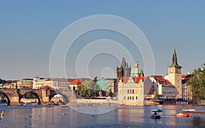 Scenic view of Old Town pier architecture and Charles Bridge over Vltava river in Prague, Czech Republic. Prague cityscape