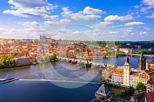 Scenic view of the Old Town pier architecture and Charles Bridge over Vltava river in Prague, Czech Republic. Prague iconic