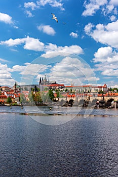 Scenic view of the Old Town pier architecture and Charles Bridge over Vltava river in Prague, Czech Republic. Prague iconic