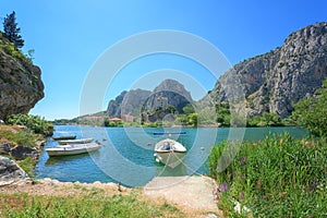 Scenic view of Omis where the Cetina river meets the Adriatic sea, Dalmatia, Croatia, outdoor travel background