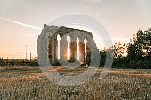 Scenic view of one of the pillars of Aqua Claudia in Rome with a sunset in the background