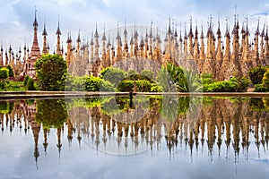 Scenic view of pagodas in Kakku with water reflection, Myanmar