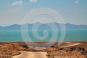 Scenic view of the panoramic desert landscapes of Loiyangalani District against the background of Lake Turkana in Turkana, Kenya