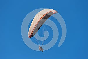 Scenic view of a paraglider on a sunny day.