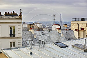 Scenic view of Parisian roofs and Eiffel tower from Montmartre