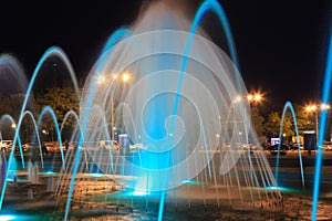 The scenic view of picturesque fountain with colorful illumination at night, Ukraine Dnepropetrovsk city, Dnipro . Creative water photo