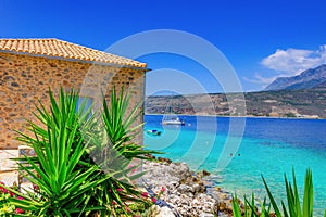 Scenic view from the picturesque seaside village Limeni. Traditional houses and colorful stoned buildings in Limeni, Mani area,