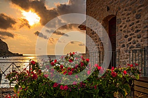 Scenic view from the picturesque seaside village Limeni. Traditional houses and colorful stoned buildings in Limeni, Mani area,