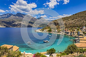 Scenic view from the picturesque seaside village Limeni. Traditional houses and colorful stoned buildings in Limeni, Mani area,