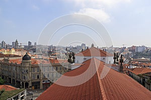 Scenic view of Porto, Portugal from the tower Cl rigos Church. Orange roofs of the houses